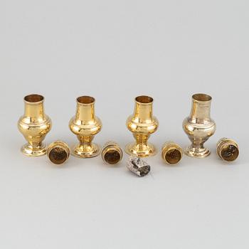 Four English 18th century silver-gilt caster-cruet, one pair marked Thomas Shepherd, 1790, one John Delmester 1760,