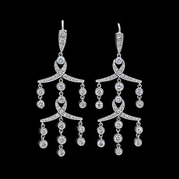 1057. A pair of antique cut diamond earrings, tot app. 1.80 cts.