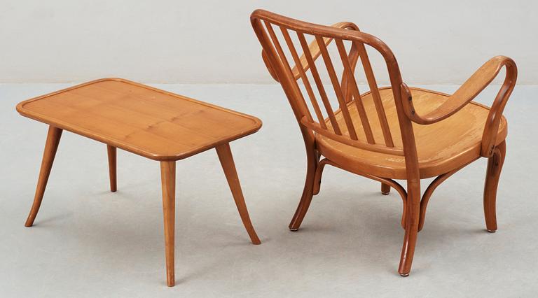 A birch bentwood armchair and table, by Thonet, 1930's.