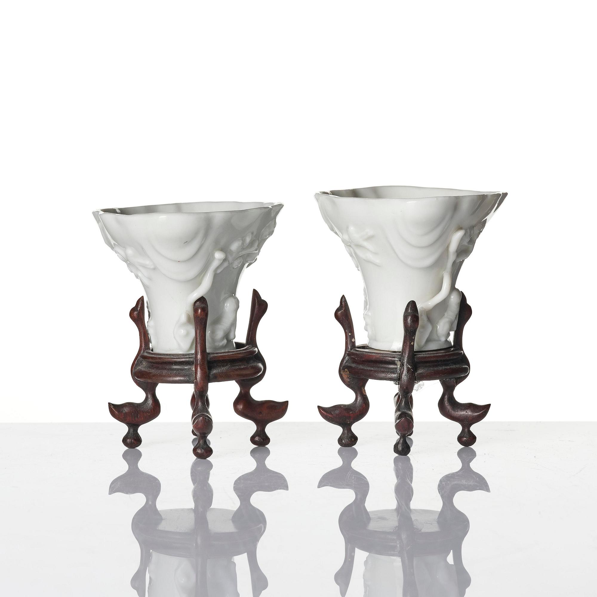 Two blanc de chine rhinoceros libation cups, Qing dynasty, Kangxi (1662-1722).