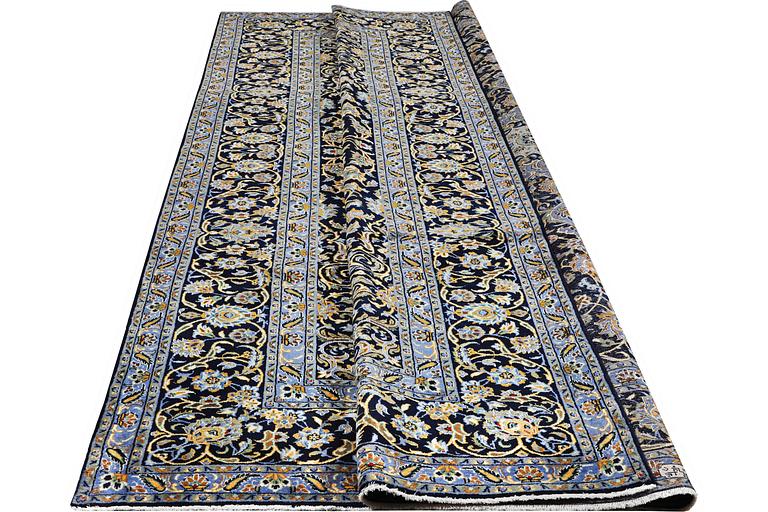 A carpet, Kashan, c. 393 x 297 cm.