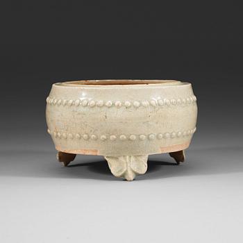 183. A pale celadon glazed tripod censer, presumably Yuan dynasty (1280-1367).