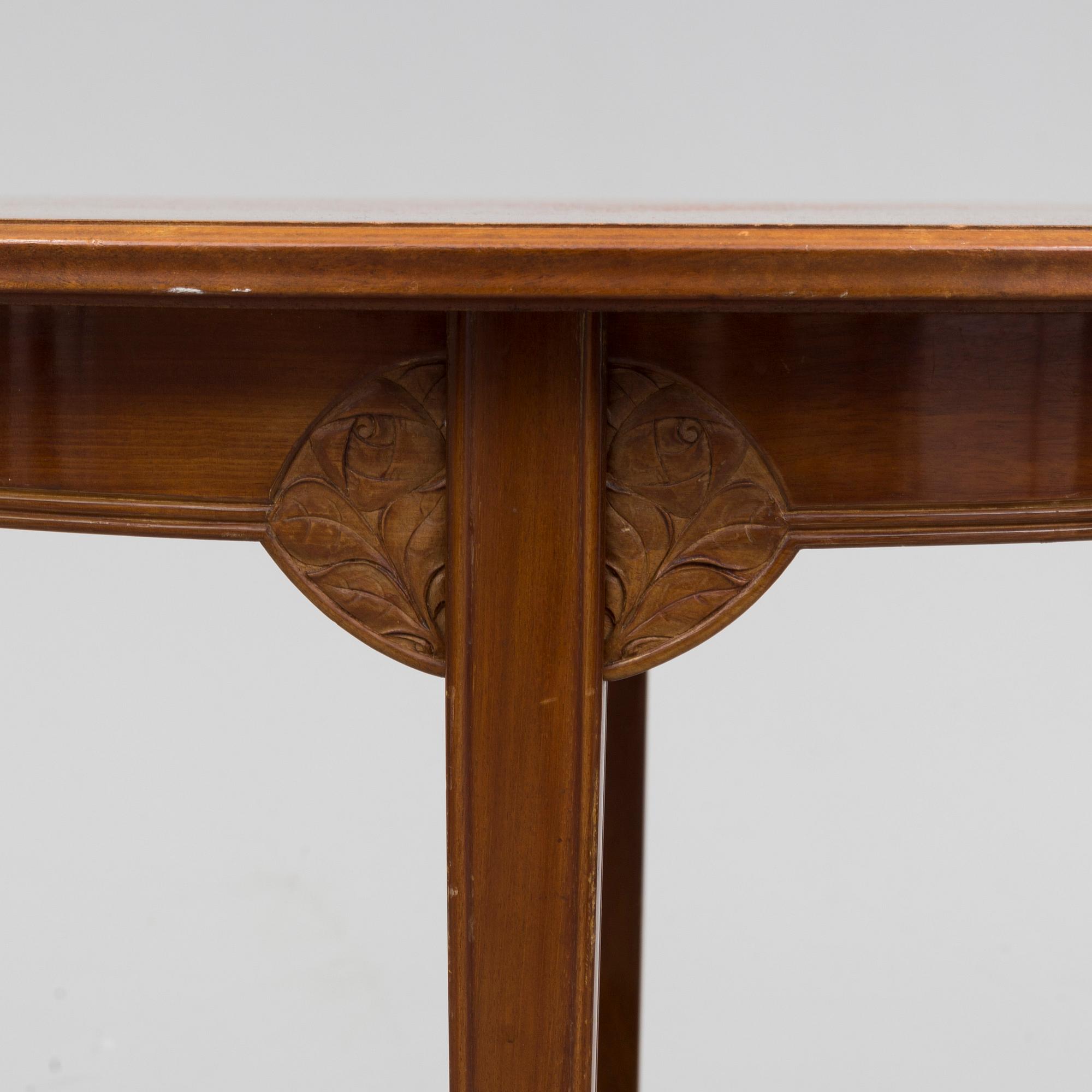 An early 20th century art nouveau table.
