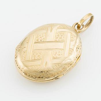 Medaljong/Fotogömma, 18K guld.