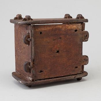 A cheese mould, dated 1768.