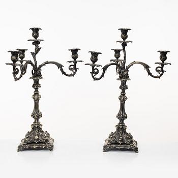 A pair of silver plated Rococo style candelabra, 20th century.