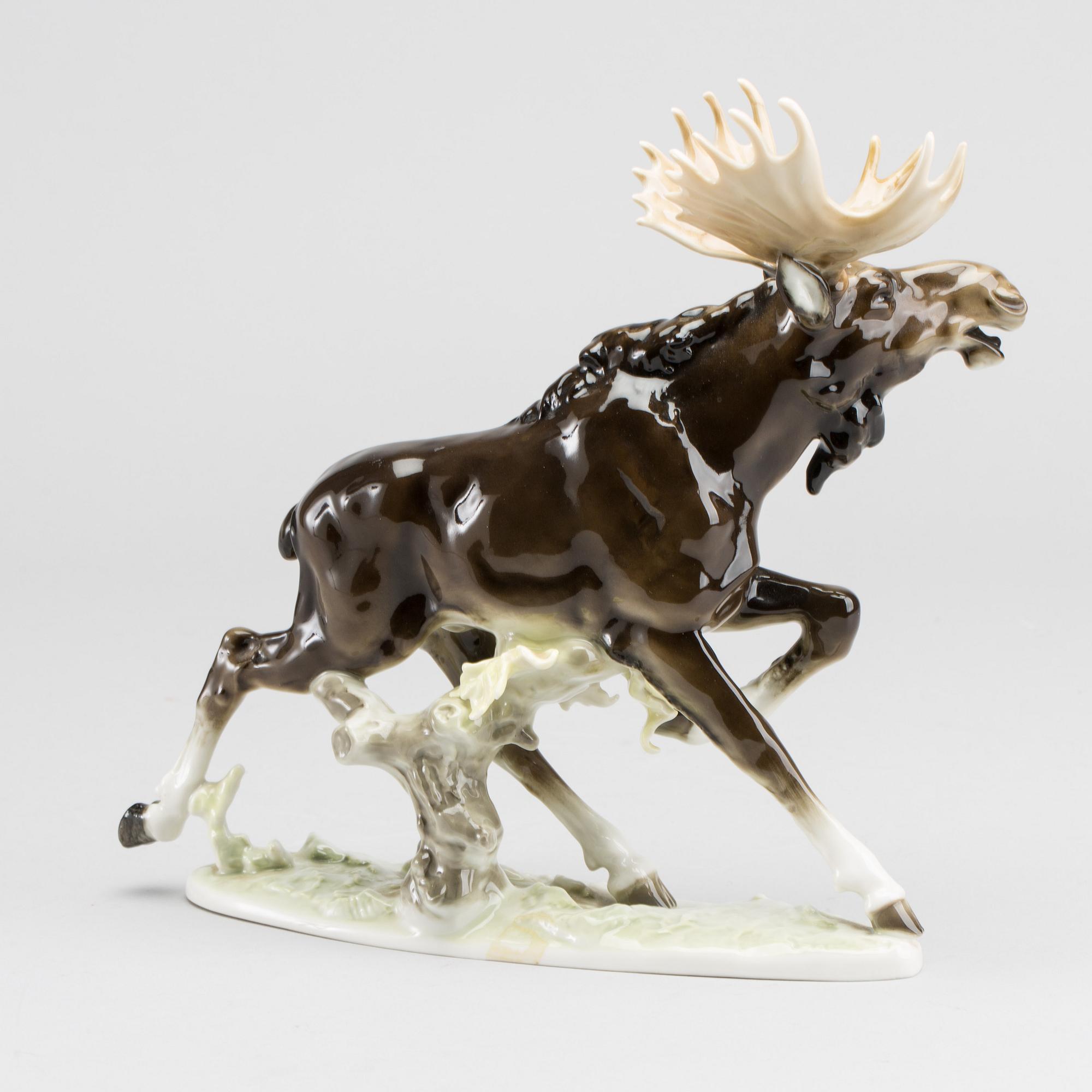 A PORCELAIN FIGURINE BY KARL TUTTER FOR HUTSCHENREUTER.