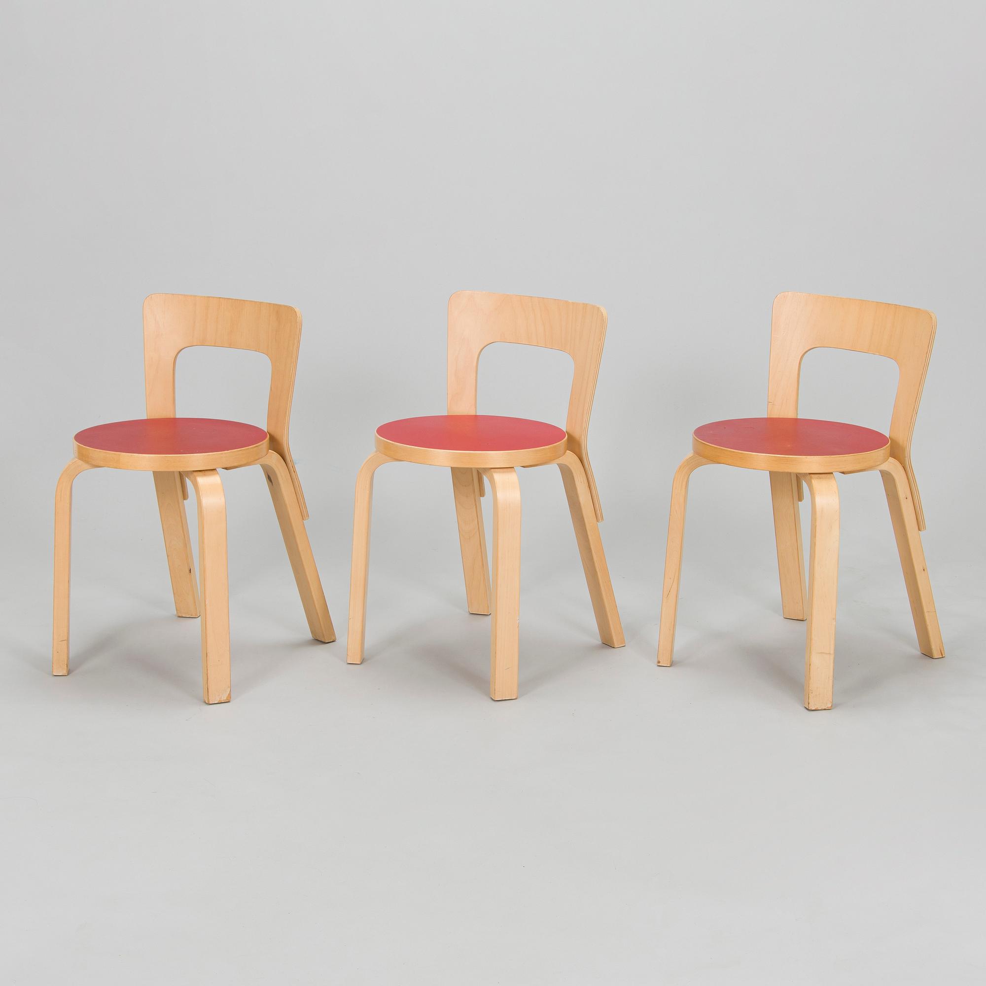 Alvar Aalto, A mid-20th century drop leaf table and three chairs for O.Y. Huonekalu-ja Rakennustyötehdas A.B.
