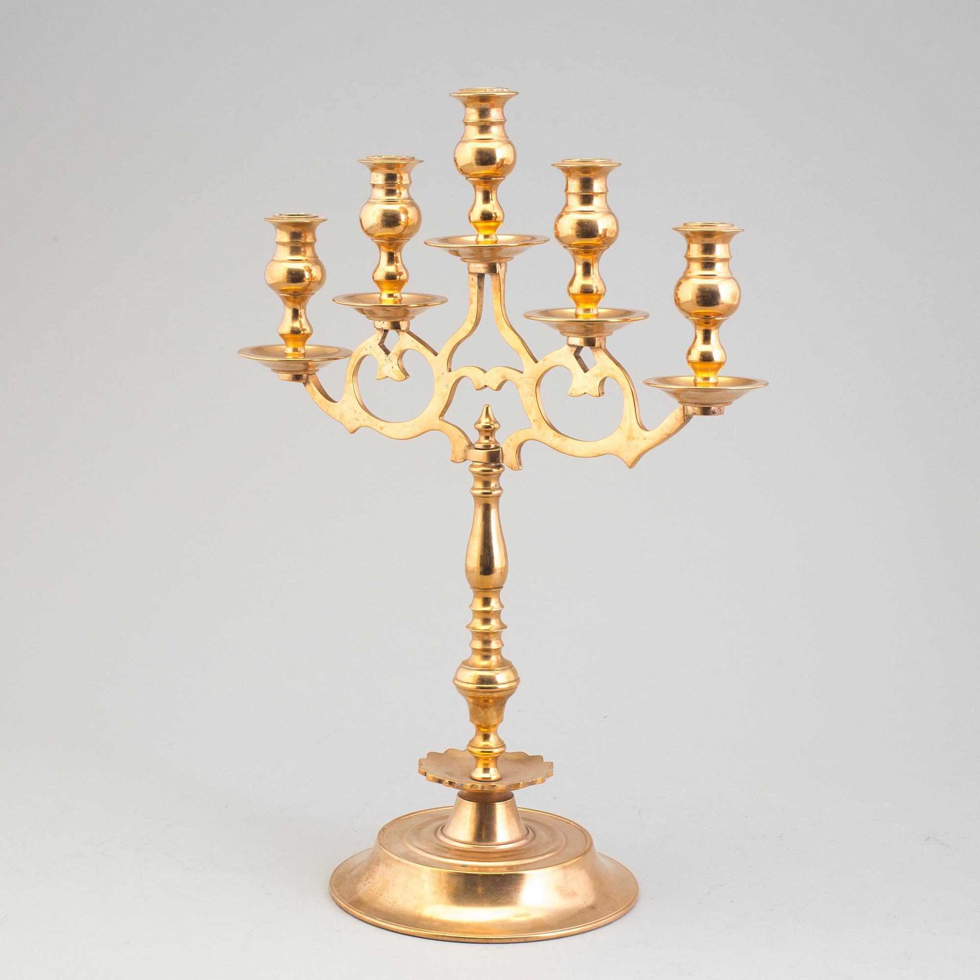 A pair of brass baroque style candelabra, early 20th century.