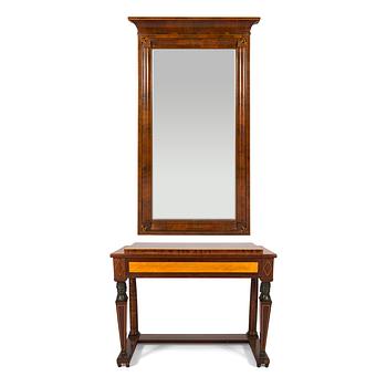 An Empire console table with mirror from around 1810.