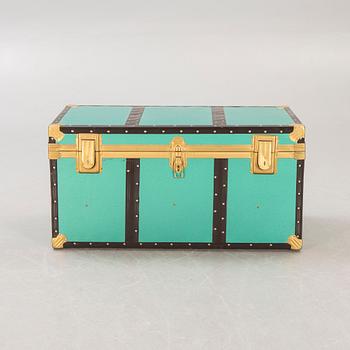 A mid 1900s metal trunk.