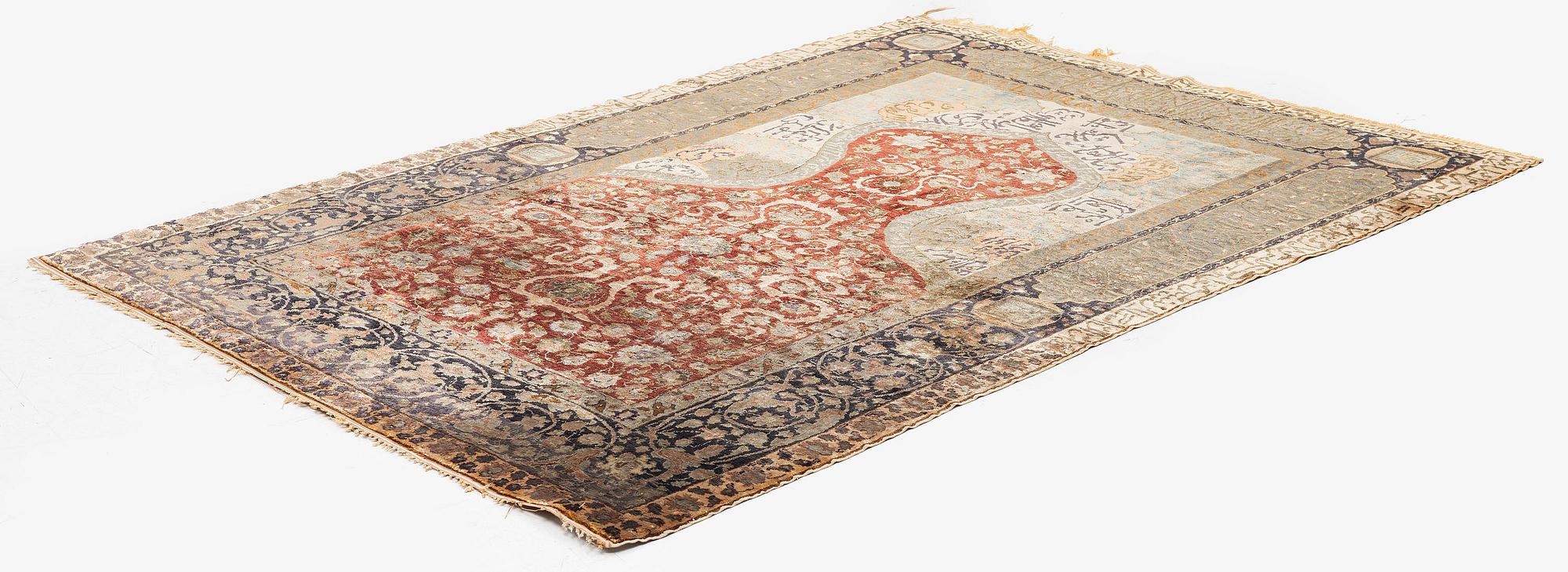 An antique silk rug, probably Istanbul, Turkey, c. 181 x 127 cm.