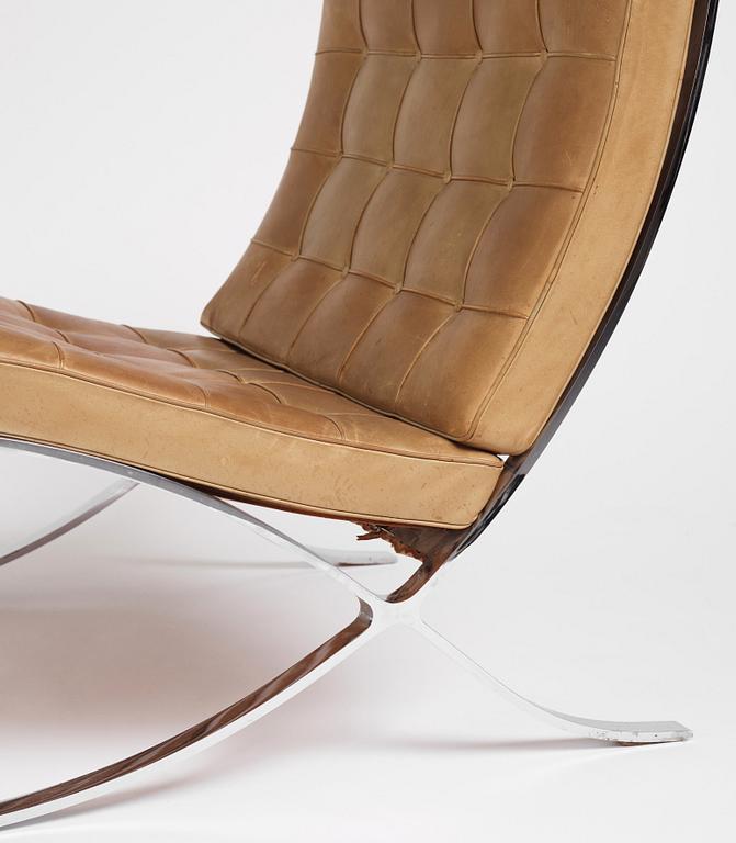 Ludwig Mies van der Rohe, a "Barcelona" easy chair and ottoman, Knoll, 1970s.