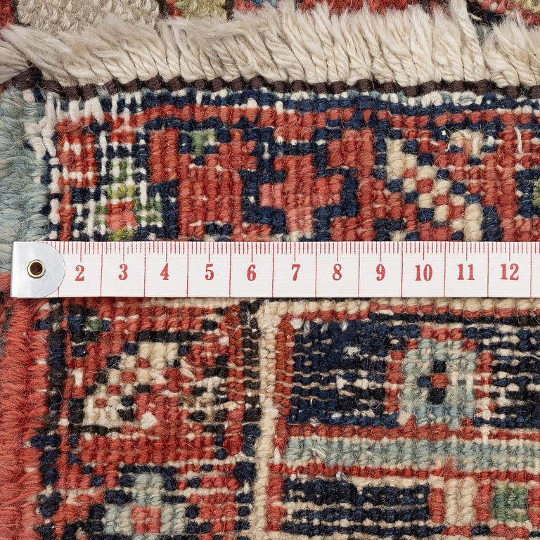 An Antique Heriz carpet, north west persia, c. 420 x 210 cm.