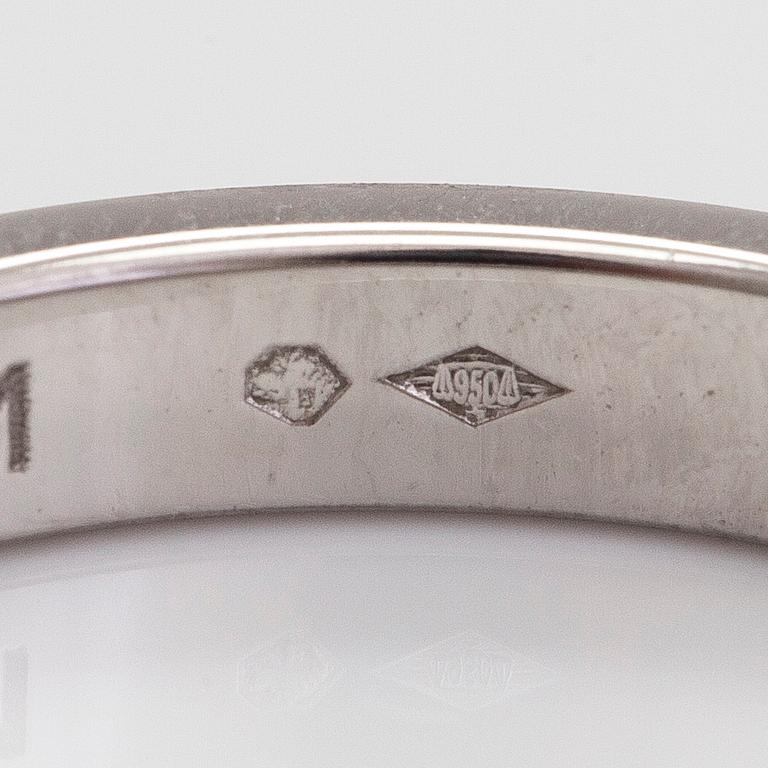 Cartier, a "C de Cartier" platinum ring.