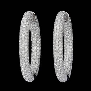 A pair of diamond, 8.52 cts in total, hoop earrings.