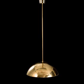A mid 20th century pendant light for Taito Finland.