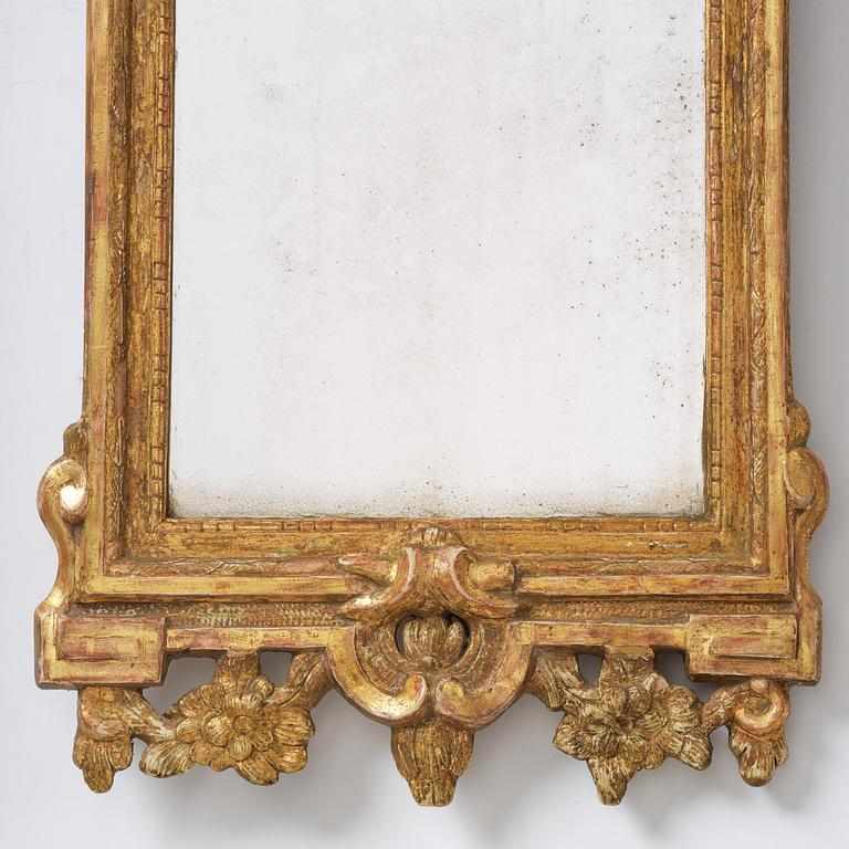 A Swedish rococo giltwood mirror, Stockholm, later part 18th century.
