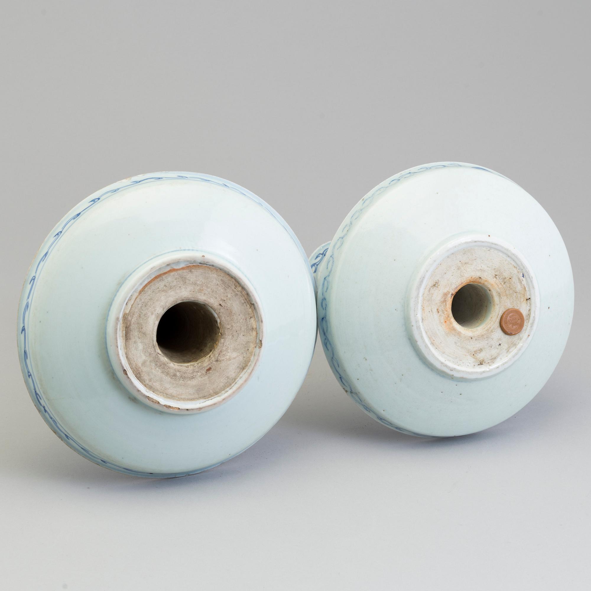 A large pair of Chinese blue and white porcelain incense holders/candle holders, Qing dynasty, 19th century.