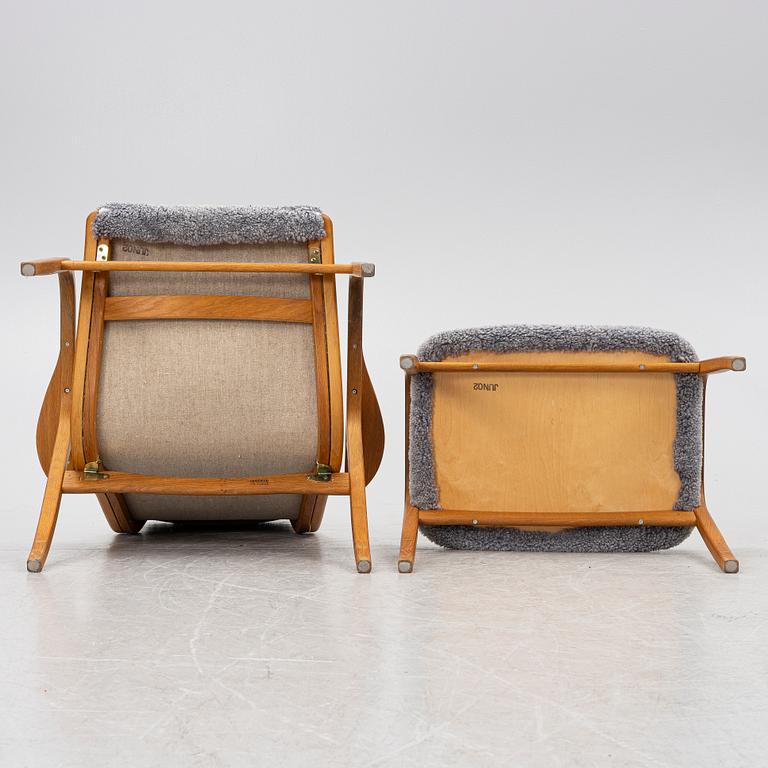 Yngve Ekström, a 'Lamino' armchair with ottoman and sidetable, Swedese, Sweden, 21st century.