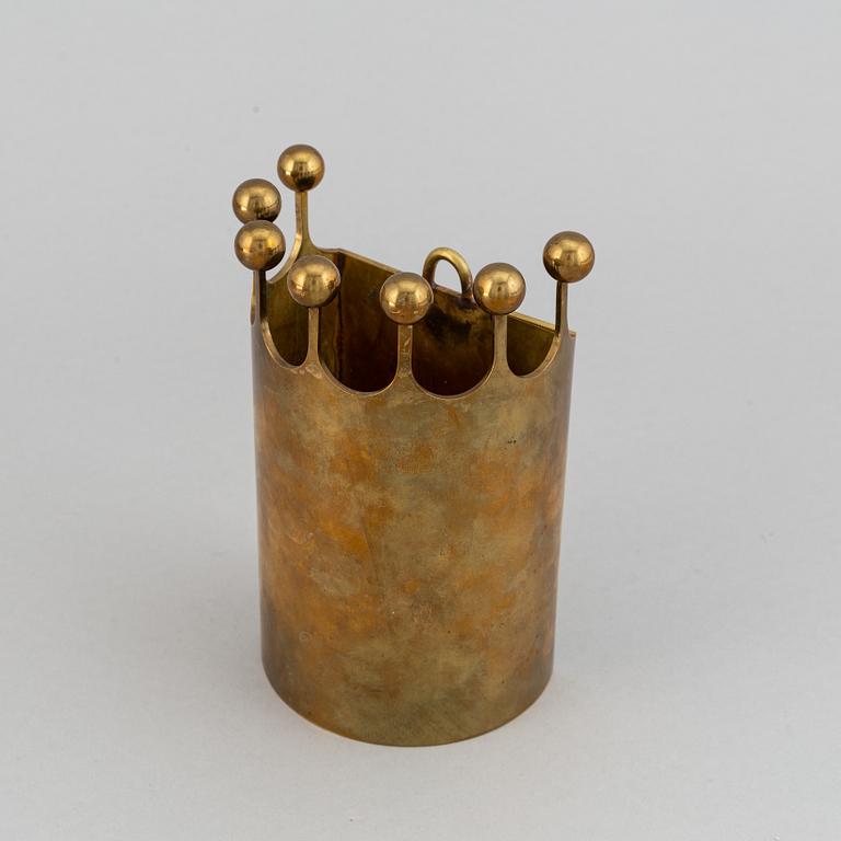 A wall-mounted brass vase by Pierre Forsell from Skultuna.