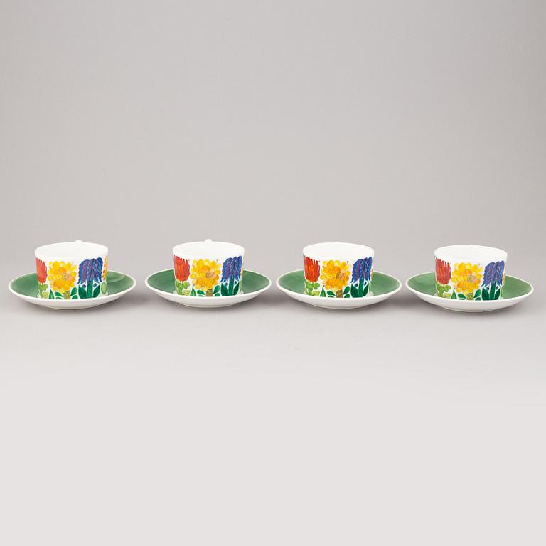 A set of four 'Tahiti' tea cups with plates by Stig Lindberg for Gustavsberg.