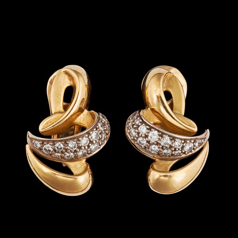 A pair of Boucheron diamond earrings. Total carat weight circa 0.50 ct. Mo. 39197.
