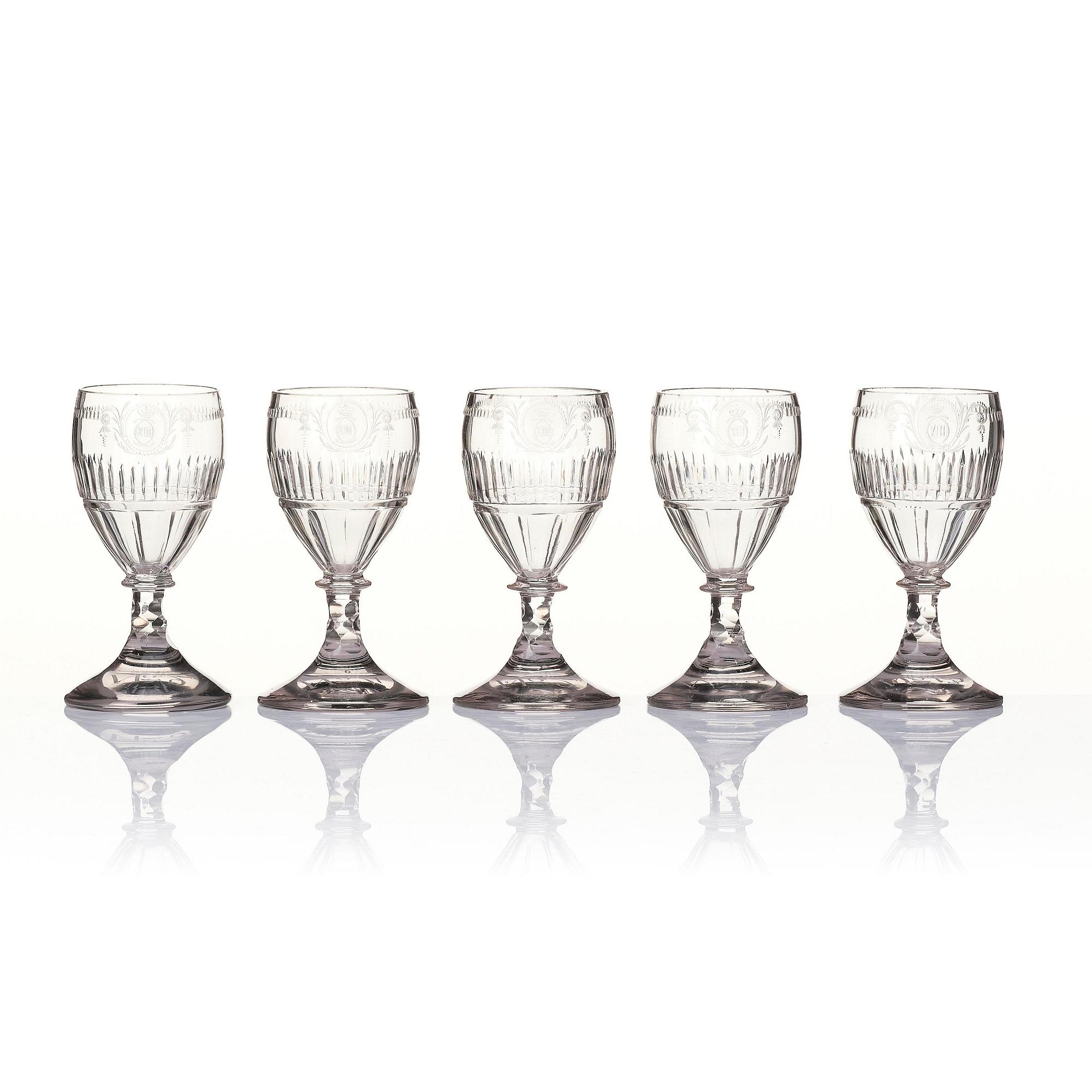 A 12 part glass service engraved by Anders Spolander, with the monogram of Carolus XIII, Reijmyre Sweden, 1810’s.