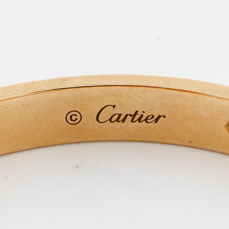 CARTIER, Love bracelet with four brilliant cut diamonds ca 0.40 ct in total.