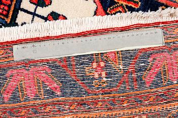 A north west persian rug, 218 x 159 cm.