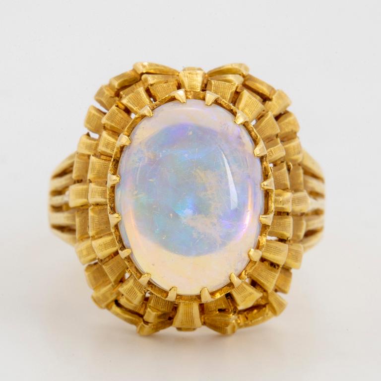 18K gold and opal.