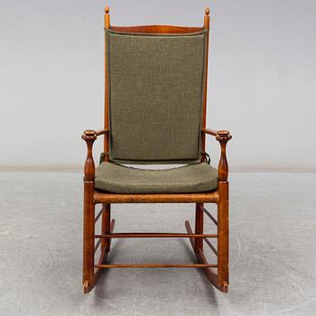 An early 20th century rocking chair.