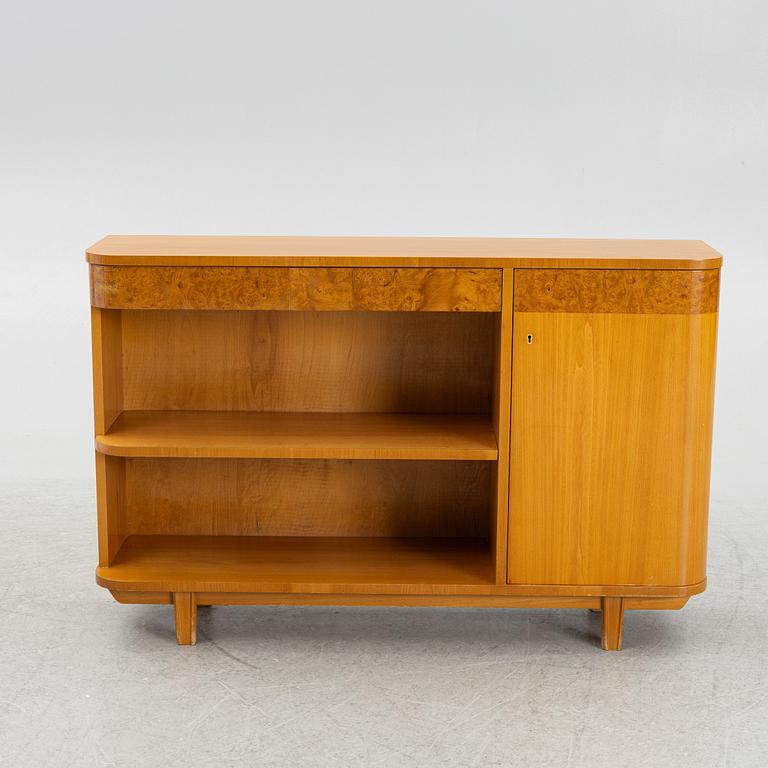 A Swedish Modern bookcase with cabinet, 1940's.