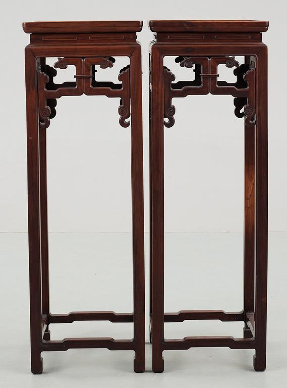A set of two hardwood pedestals, presumably late Qing dynasty.