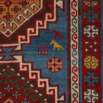 A RUG, a semi-antique Gendje probably, ca 209 x 124 cm.