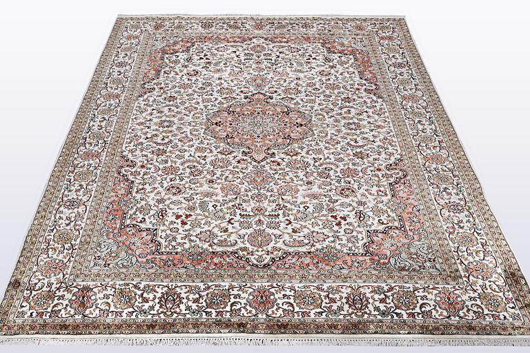 A carpet, silk Kashmir, ca 260 x 172 cm.