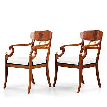 A pair of Swedish Empire armchairs, 1820-40's.