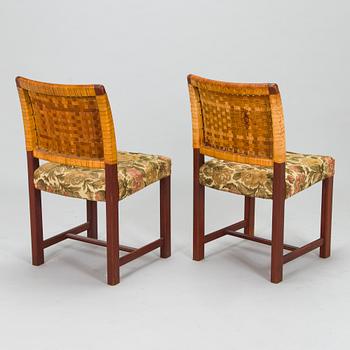 Carl Gustaf Hiort af Ornäs, a mid-20th-century 'Näyttely Senior' dining table and 12 chairs for HMN Huonekalu Nupponen.