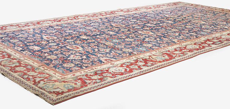 An antique cotton Agra of 'Ziegler Mahal' design, Northern India, c. 647 x 330 cm.