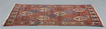 A RUG, an old Bachtiari, ca 213,5 x 142-147,5 cm.