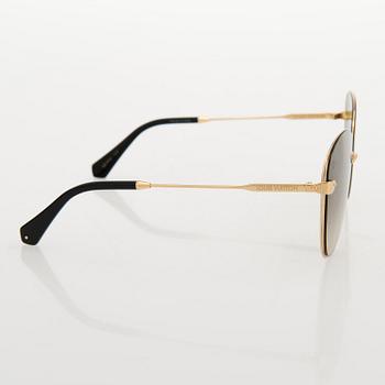 Louis Vuitton, 'À Nous Deux' sunglasses and a Chouchou scrunchie.