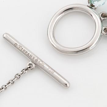 A Tiffany & Co three strand faceted aquamarine bead necklace with an 18K white gold clasp.