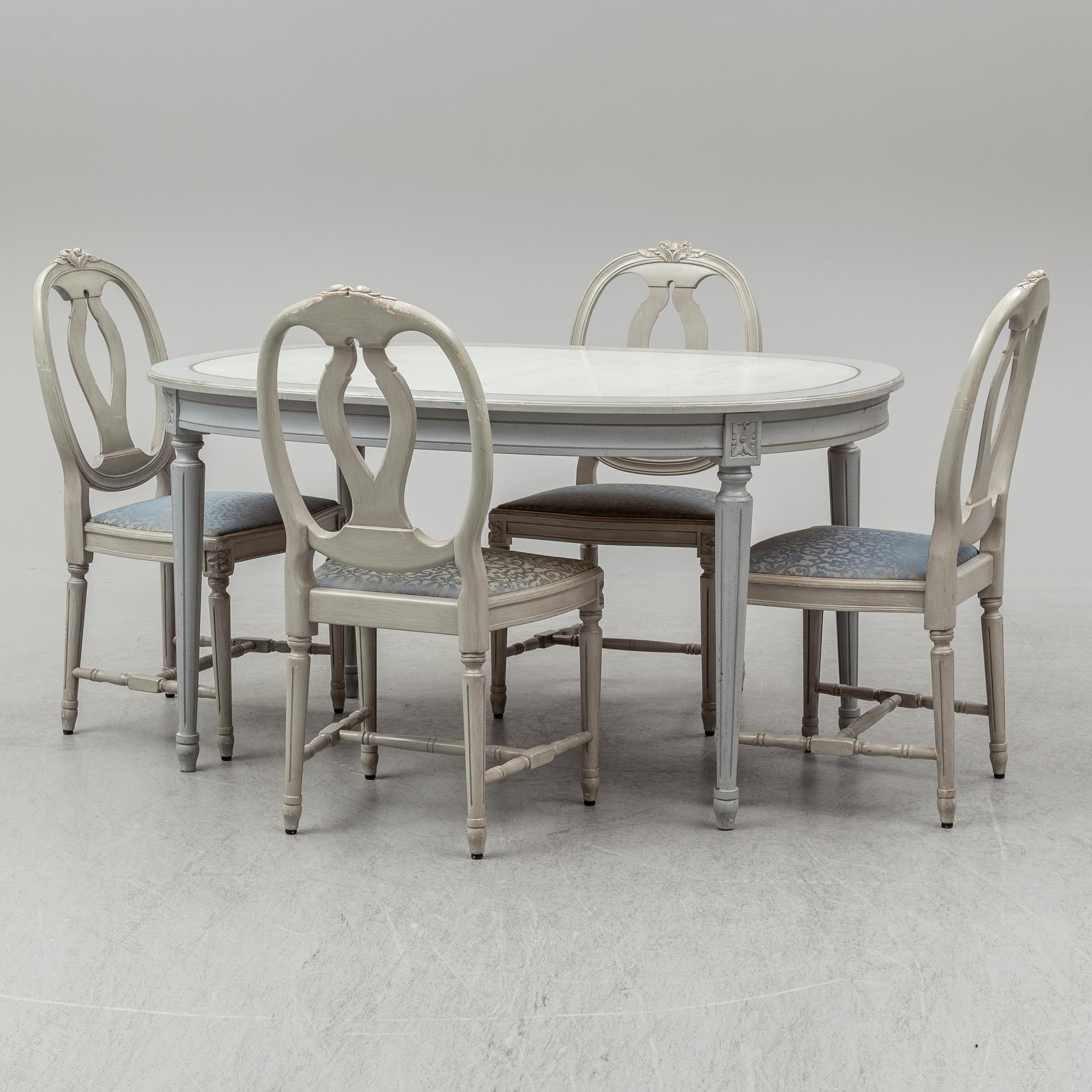 A dining table and four chairs, gustavian style, late 20th century.