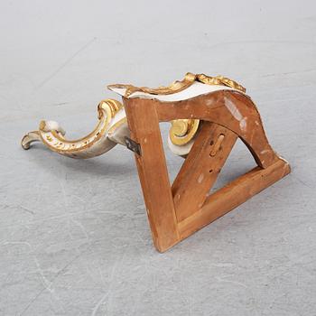 A samll console table for a corner with a wooden top.