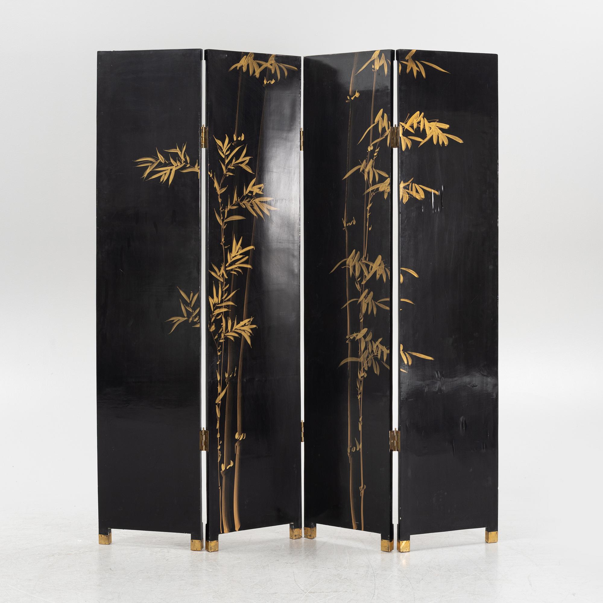 A Chinese lacquer folding screen, 20th century.