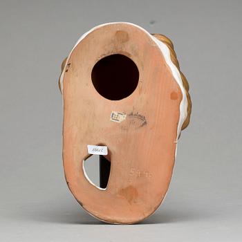An Adolf Prischl terracotta wall mask for Goldscheider, mid 1900.
