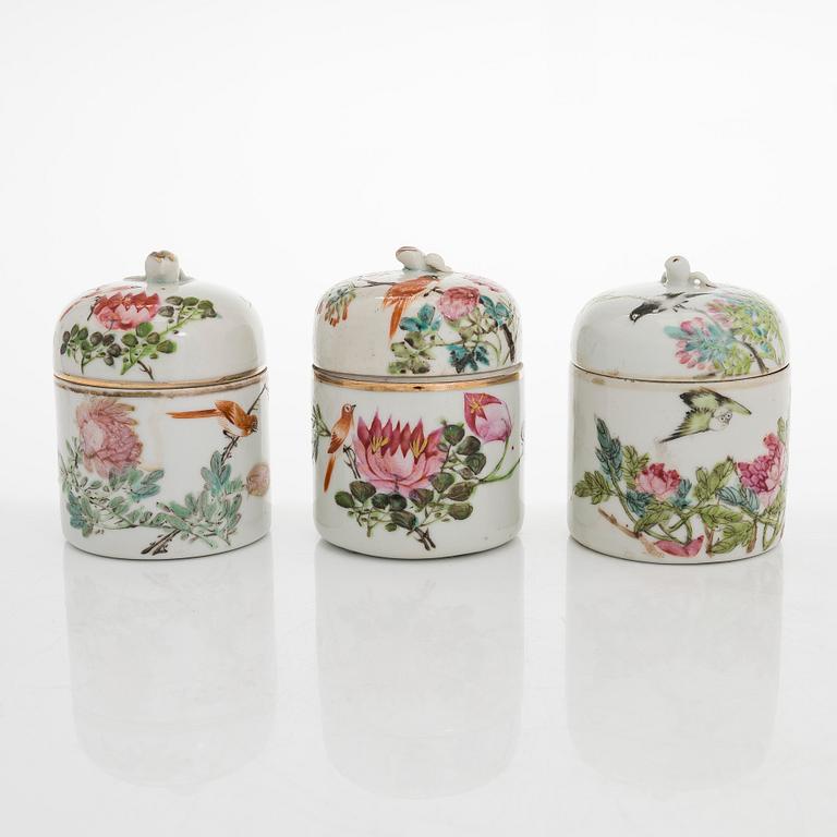 A porcelain food container and three lidded cups, China, circa 1900.