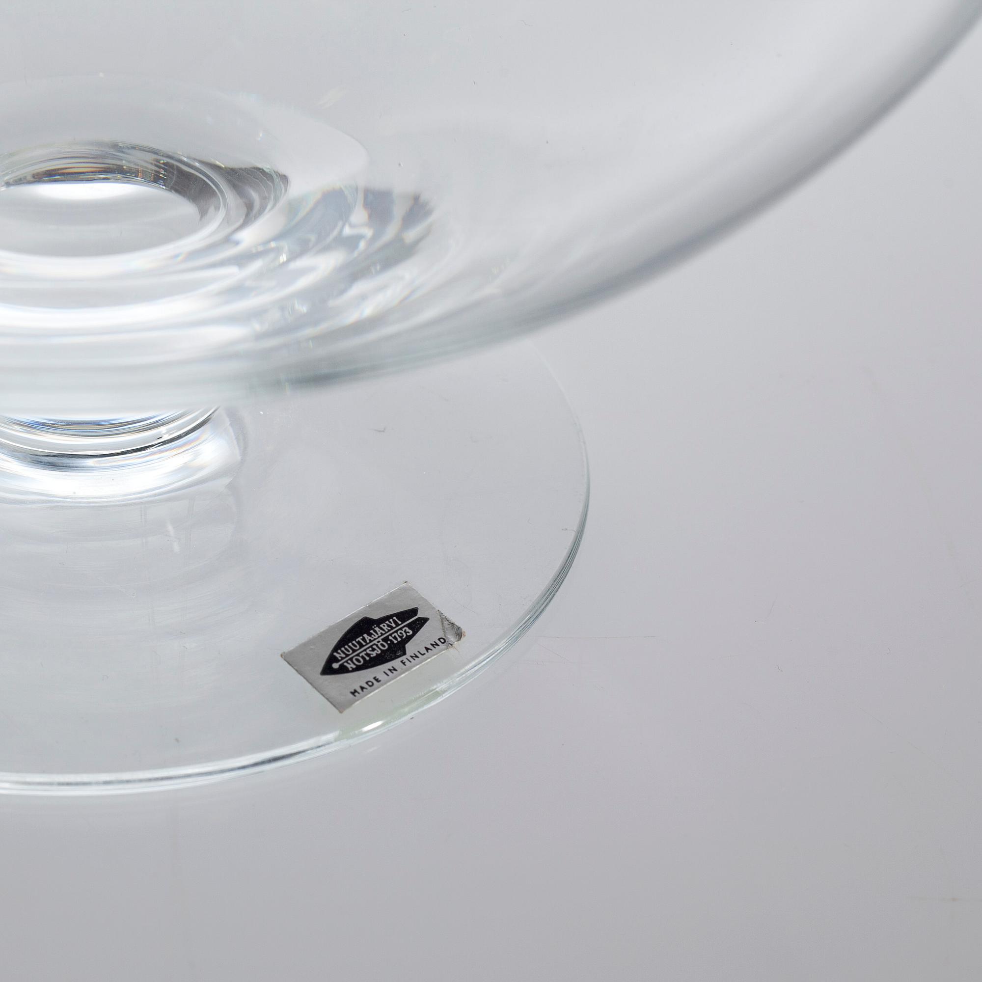 A glass punch bowl and ladle by Nuutajärvi, Finland from the second half of the 20th century.