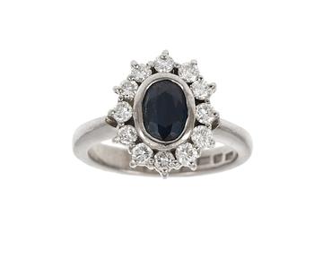 592. RING, blå safir och briljantslipade diamanter, tot. ca 0.50 ct.