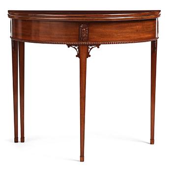 30. A late Gustavian mahogny games table.